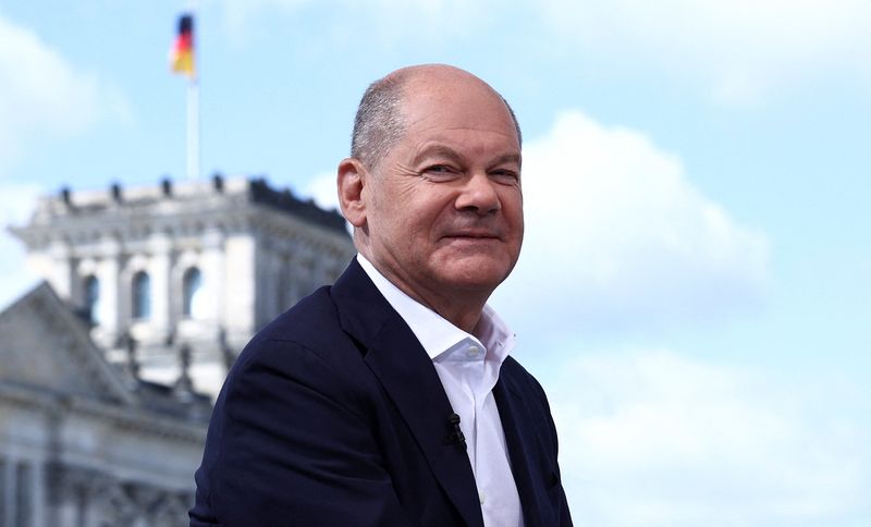 Germany’s Scholz says he will keep social agenda in budget deal