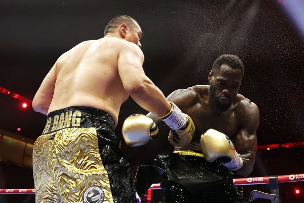 Zhang finishes Wilder in brutal fifth-round TKO