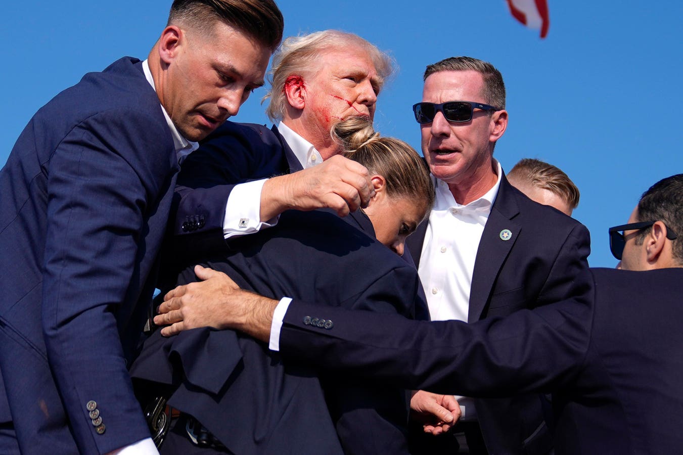 A Bloodied Trump Hurried Off Stage During Rally