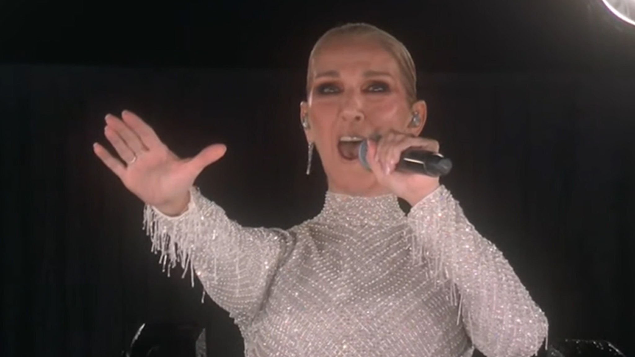 Celine Dion Chokes Up Performing at Olympics Opening Ceremony